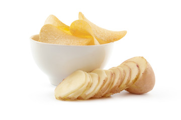 crispy chips and raw potato on white background