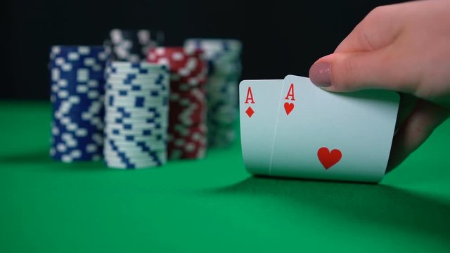 Lucky poker hand, player holding aces, winner, successful strategy. Texas holdem. High chances of winning, strong strategy