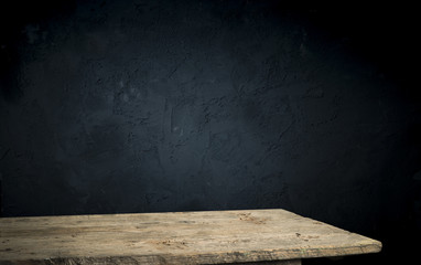 Dark room with tile floor and brick wall background
