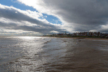 Southwold Seafront with Contrasting Sun and Clouds