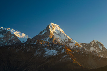 Machapuchhare mountain top in the Himalaya range, seen from Poon Hill tower in Nepal.