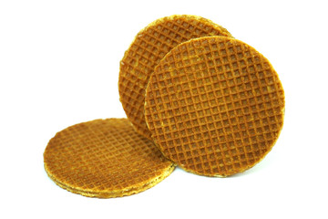Holland round waffles with caramel filling isolated on white background.