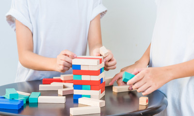 Learning developmental kids toys. Geometric stacker, organic wooden baby toys. Copy space