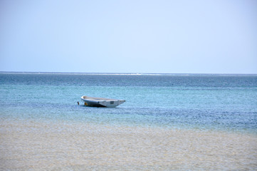 Obraz premium Boat in Mauritius Ocean