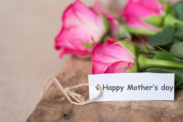 Beautiful pink roses with Happy Mother's day tag card