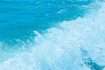 Blue water surface with wave.