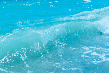 Blue water surface with wave.