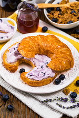 Croissants with Blueberry Cream Cheese Spread. Continental Breakfast. Selective focus.