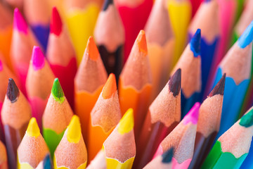 Education or back to school Concept. Close up macro shot of color pencil pile pencil nibs on white...