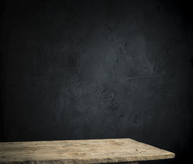 Dark room with tile floor and brick wall background