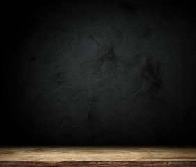 Dark room with tile floor and brick wall background