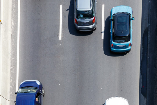 Top View Of Cars Moving On Highway