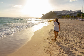 on afternoon alone woman walk on the beach