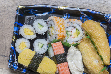 a set of sushi menu at various Japanese restaurants