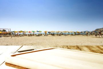 Table background and beach landscape. Free space for your decoration. 