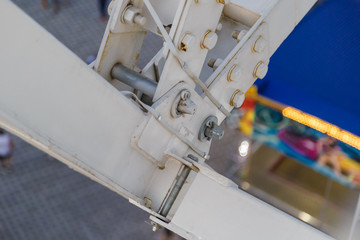 Details of the ferris wheel close-up, cab and mounts.