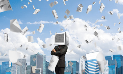Businessman with monitor instead of head.