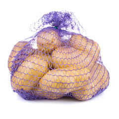 raw potatoes in a blue net bag isolated on white background