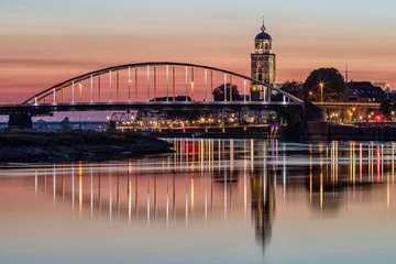 Papier Peint photo Lavable Brugges Deventer bridges over river IJssel at sunset