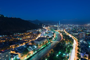 Fototapeta na wymiar Panoramic view of Providencia and Las Condes districts and Bellavista Neighborhood, Santiago de Chile