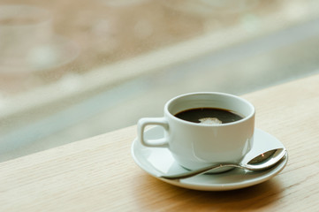  cup of coffee background in the morning sunlight.