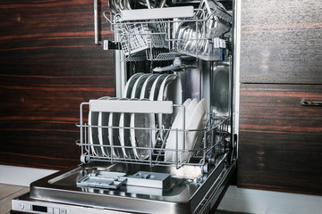 clean dishes and Cutlery in the dishwasher. work on cleaning the house