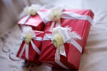 Boxes of gifts decorated with ribbons.