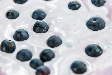 the berries ripe blueberries in yogurt. healthy Breakfast or dessert