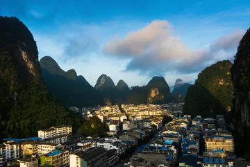 Rolgordijnen Cityscape of Yangshuo in China and famous karst formations © creativefamily