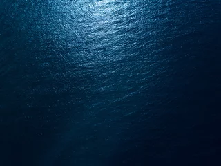 Crédence de cuisine en verre imprimé Eau Sea surface aerial view. Dark and contrast version