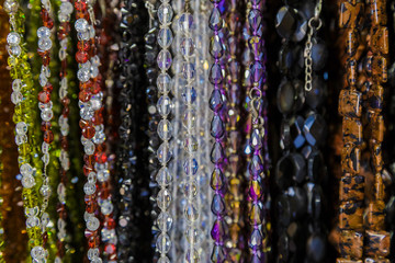 beautiful multicolor beads in necklace form, marvelous colorful beads in necklace form as background, texture.