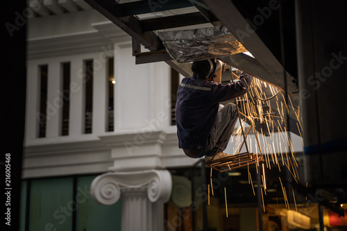 Engineer Steel Welding And Sit On Chair Hang On Building