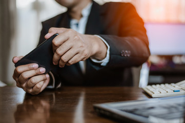 Businessman plying Video Games on his Smartphone During breaks.