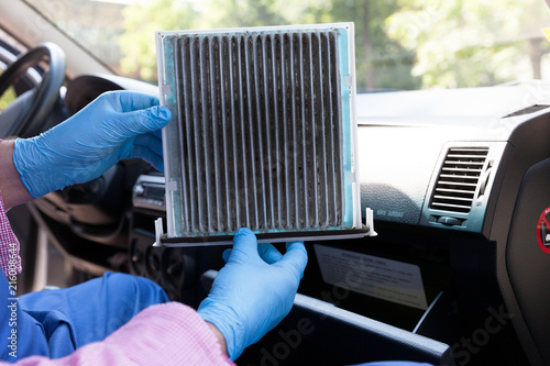 Replacing Dirty Cabin Pollen Air Filter For A Car Stock Photo And