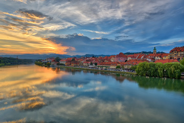Fototapeta na wymiar Maribor, Slovenia, Europe. Popular riverbank Lent by the river Drava. Beautiful sunset scenery
