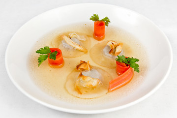 Plate with chicken soup