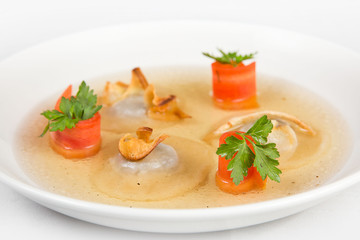 Plate with chicken soup