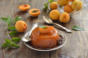 Apricot panna cotta with chocolate shavings and mint