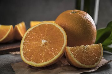 Beautiful, fresh orange on the dark background. Healthy sweet food concept.