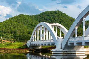 Old white railway bridge constructed at Lamphun, Thailand.