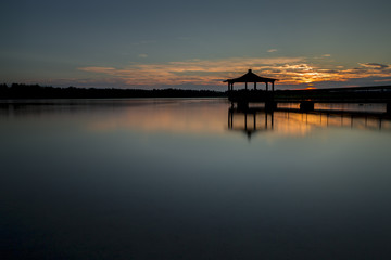 Gazebo in Lake with Sunset