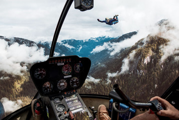 Skydiver and Helicopter © Felix