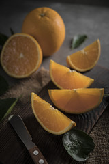 Beautiful, fresh orange on the dark background. Healthy sweet food concept.