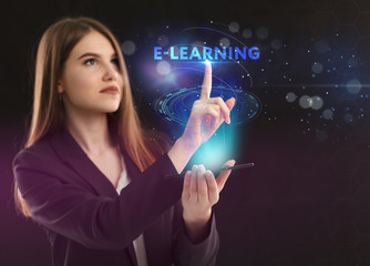 The concept of business, technology, the Internet and the network. A young entrepreneur working on a virtual screen of the future and sees the inscription: E-learning