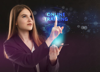 The concept of business, technology, the Internet and the network. A young entrepreneur working on a virtual screen of the future and sees the inscription: Online training