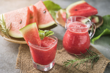 Watermelon drink in glasses with slices of watermelon