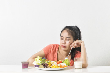  Woman does not like vegetable. Unhappy woman  does not like healthy food, Emotional face.
