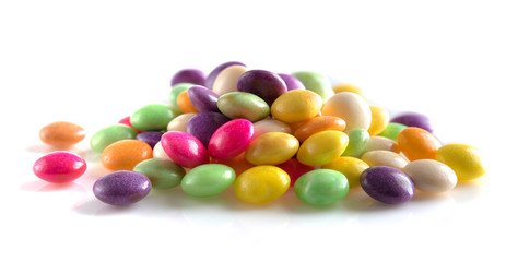 Colorful candies on white background