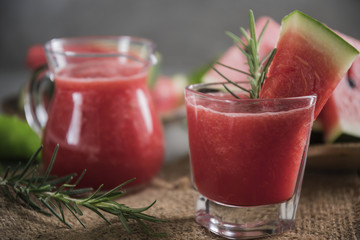 Watermelon drink in glasses with slices of watermelon