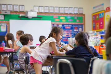 Students in a kindergarten classroom. 
